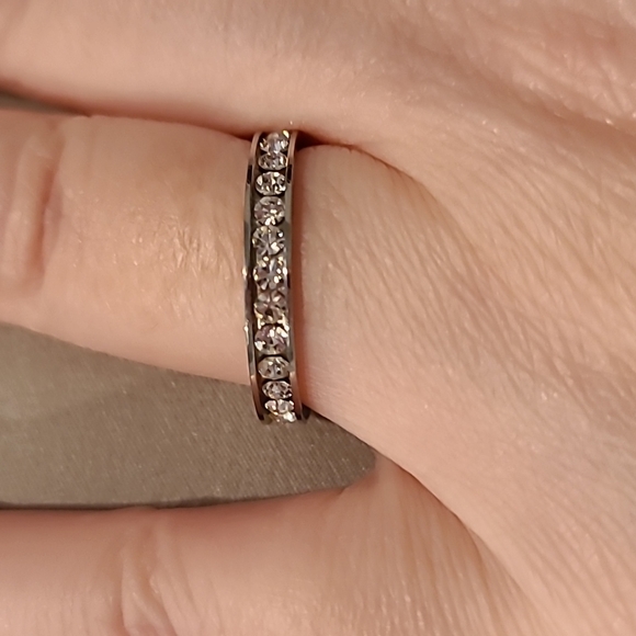 Eternity style cubic zirconia stainless steel channel set stones ring - Picture 1 of 7